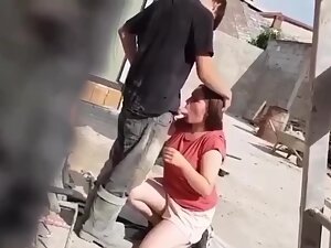 Cute girl caught while sucking dick of construction worker