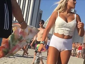 White shorts are squeezing her pussy