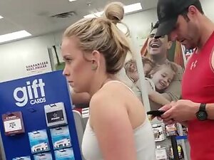 Casual milf inspected while at cashier