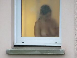 Voyeur Through Window - Watching incredible tits through her bathroom window - Voyeurs HD