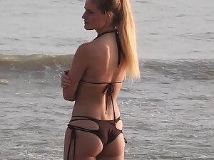 Inspection of hot ass in a unique bikini