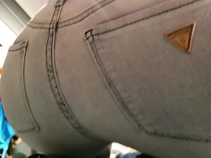 Candid camera sniffs a butt in jeans